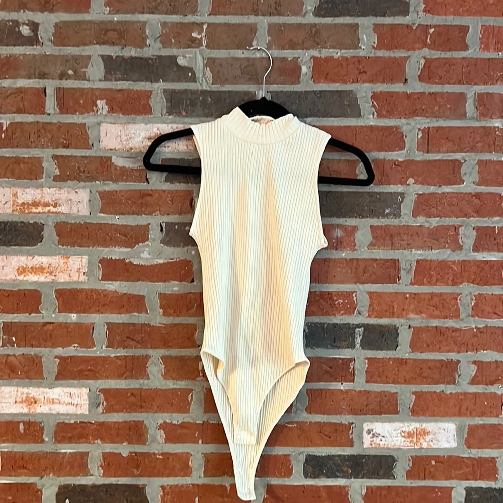 Beige body suit